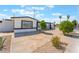 Well-maintained single-story home with a spacious driveway and low-maintenance landscaping at 517 N 22Nd St, Las Vegas, NV 89101