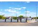 Charming single-story home with a manicured front yard under a beautiful sunny sky at 517 N 22Nd St, Las Vegas, NV 89101