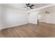 Bright and airy living room featuring modern lighting, fresh paint, and wood floors at 517 N 22Nd St, Las Vegas, NV 89101