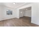 Bright living area with hardwood floors, white walls and a large window at 517 N 22Nd St, Las Vegas, NV 89101