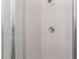 Close up on a modern shower with clear glass, chrome fixtures, and clean white tiles at 517 N 22Nd St, Las Vegas, NV 89101