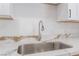 Close-up of modern kitchen sink featuring quartz countertop and stainless steel faucet at 517 N 22Nd St, Las Vegas, NV 89101