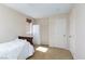 Bedroom featuring carpet, small window, closet, and neutral walls at 5229 Giallo Vista Ct, North Las Vegas, NV 89031