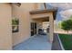 View of covered patio, stainless steel BBQ, and backyard at 5229 Giallo Vista Ct, North Las Vegas, NV 89031