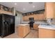 Updated kitchen featuring sleek countertops, stainless steel appliances, and ample cabinet space at 5229 Giallo Vista Ct, North Las Vegas, NV 89031