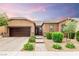 Attractive single-story home boasting a manicured front yard and a spacious two-car garage at 5616 Silver Cascade Ave, Las Vegas, NV 89131