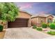 Two-car garage with brick-paved driveway at 5616 Silver Cascade Ave, Las Vegas, NV 89131