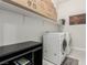 Well-organized laundry room equipped with modern washer and dryer units at 5616 Silver Cascade Ave, Las Vegas, NV 89131
