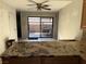 Bright kitchen with granite countertops, tile floors, and sliding glass doors to the backyard at 6521 Sugarpine Ln, Las Vegas, NV 89107