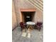 Outdoor patio with table and chairs, perfect for relaxing or entertaining guests at 6521 Sugarpine Ln, Las Vegas, NV 89107