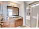 Bathroom features granite countertop, new fixtures and a shower with glass door at 7200 Pirates Cove Rd # 2084, Las Vegas, NV 89145