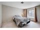 Bright bedroom featuring a window seat, perfect for reading or enjoying the natural light at 7200 Pirates Cove Rd # 2084, Las Vegas, NV 89145