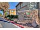 Attractive condominium signage, landscaping, and street view at 7200 Pirates Cove Rd # 2084, Las Vegas, NV 89145