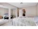 Bedroom with mirrored closet doors, creating a sense of spaciousness and functionality at 7200 Pirates Cove Rd # 2084, Las Vegas, NV 89145