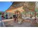 Community playground with slides and a canopy shade structure on a sunny day at 7200 Pirates Cove Rd # 2084, Las Vegas, NV 89145