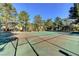 Community tennis court with mature landscaping, perfect for active residents at 7200 Pirates Cove Rd # 2084, Las Vegas, NV 89145