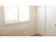 Bedroom featuring a window with shutters and standard closet at 730 Goshawk St, Henderson, NV 89015
