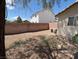 Spacious backyard with a block wall, offering privacy for outdoor activities at 732 Goshawk St, Henderson, NV 89015