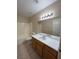 Bathroom features vanity, large mirror, and shower-tub combo at 732 Goshawk St, Henderson, NV 89015