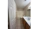 Bathroom features vanity, large mirror, and shower-tub combo at 732 Goshawk St, Henderson, NV 89015