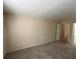 Carpeted bedroom with view to the doorway and neutral colors at 732 Goshawk St, Henderson, NV 89015