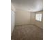 Bedroom with a carpeted floor, neutral paint and window with shutters at 732 Goshawk St, Henderson, NV 89015