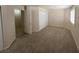 Spacious carpeted bedroom featuring large closets, a window with shutters and neutral paint at 732 Goshawk St, Henderson, NV 89015