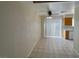 Cozy dining area featuring tile floor, ceiling fan, and sliding glass doors to the backyard at 732 Goshawk St, Henderson, NV 89015