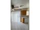 Cozy dining area featuring tile floor, ceiling fan, and sliding glass doors to the backyard at 732 Goshawk St, Henderson, NV 89015