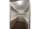 Well-organized walk-in closet with ample shelving and space for storage at 732 Goshawk St, Henderson, NV 89015