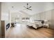 Vaulted ceiling primary bedroom with fireplace, backyard pool access and plenty of natural light at 8140 Bay Harbor Dr, Las Vegas, NV 89128