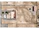 Overhead view of desert property featuring a home, fenced lot, and desert terrain at 861 S Ford Loop, Pahrump, NV 89048