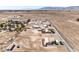 Desert property aerial view featuring a fenced lot and surrounding desert landscape at 861 S Ford Loop, Pahrump, NV 89048