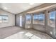 Bright breakfast nook with tile floor, mountain views, and access to backyard at 861 S Ford Loop, Pahrump, NV 89048