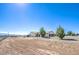 Single story home with three car garage on expansive lot with gravel landscaping and desert views at 861 S Ford Loop, Pahrump, NV 89048