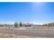 Ranch home with two-car garage and desert landscaping on a large lot at 861 S Ford Loop, Pahrump, NV 89048