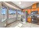 Eat-in kitchen features stainless steel appliances, tile floors, and natural light through bright windows at 861 S Ford Loop, Pahrump, NV 89048