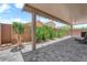 Back patio is fully covered with hardscape and perimeter landscape at 9467 Samuel Clemens Ct, Las Vegas, NV 89147