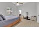 Well-lit primary bedroom includes a vaulted ceiling and a peek into the bathroom at 9467 Samuel Clemens Ct, Las Vegas, NV 89147