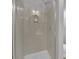 Shower stall features built-in soap holder and new shower head at 9467 Samuel Clemens Ct, Las Vegas, NV 89147