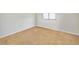 This bedroom has carpeted flooring, one window, and plain white walls at 960 Third St, Pahrump, NV 89048