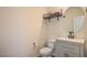 Powder room featuring modern vanity, and fixtures for a stylish and functional space at 10031 Fletcher Peak Ave, Las Vegas, NV 89178