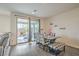Charming dining area with sliding door to patio and backyard at 10031 Fletcher Peak Ave, Las Vegas, NV 89178