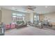 Spacious living room with comfortable seating, bright windows and views to the yard at 10031 Fletcher Peak Ave, Las Vegas, NV 89178