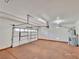 A spacious two-car garage with an automatic door opener and a water heater at 10279 Montes Vascos Dr, Las Vegas, NV 89178