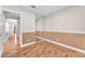 Bedroom boasts wood floors, neutral walls, and a mirrored closet for ample storage at 1038 Beaver Crest Ter, Henderson, NV 89015