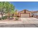 Charming single-story home with a two-car garage and well-manicured landscaping at 1038 Beaver Crest Ter, Henderson, NV 89015