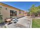 Backyard patio with seating area; perfect for outdoor dining and entertaining at 1038 Beaver Crest Ter, Henderson, NV 89015