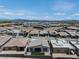 Stunning aerial view of a modern single-story home in a desert community at 11173 Concord Valley Dr, Las Vegas, NV 89135