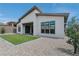 Home with green grass in the backyard at 11173 Concord Valley Dr, Las Vegas, NV 89135